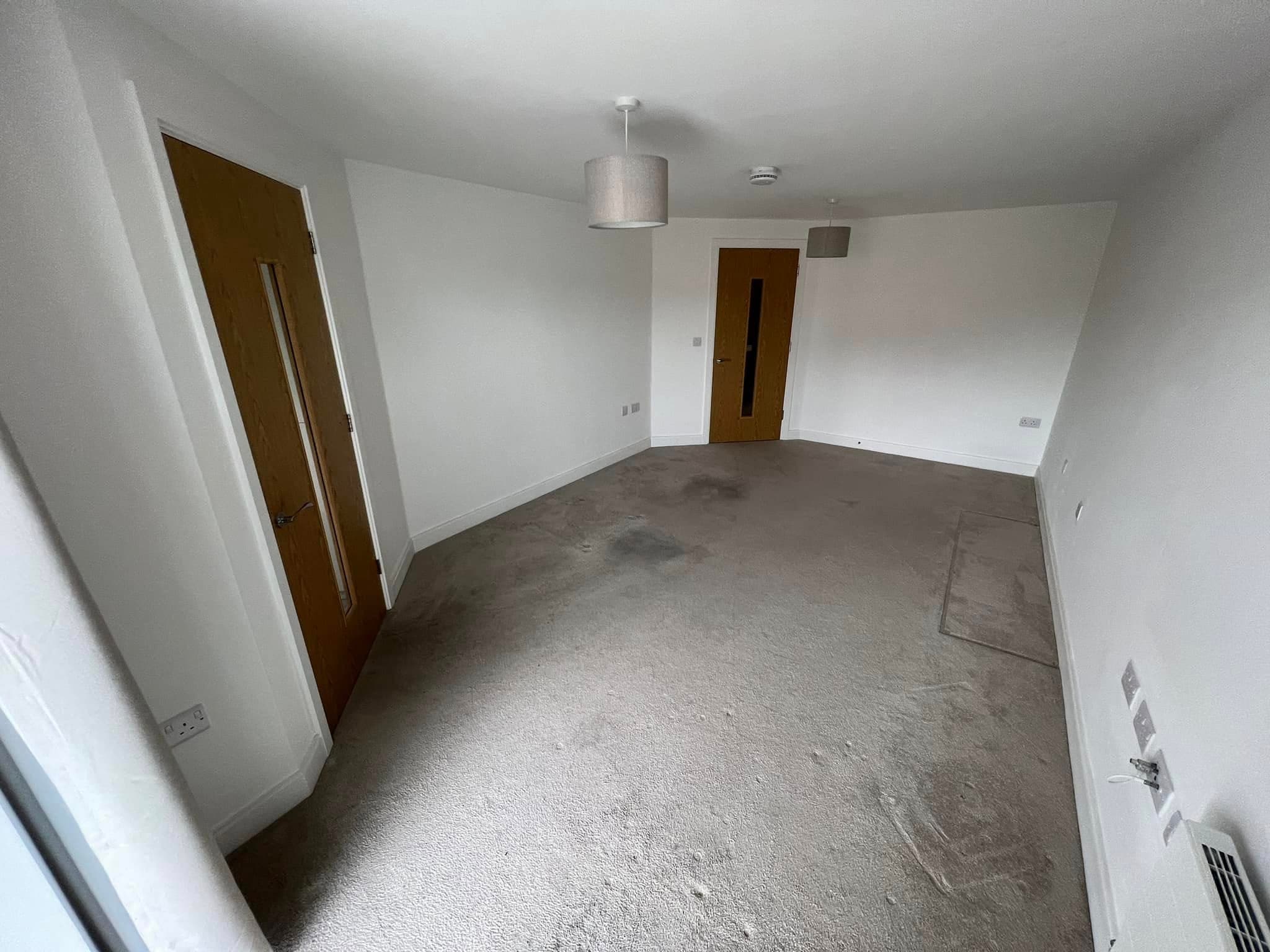 Room completely emptied and cleared after furniture removal